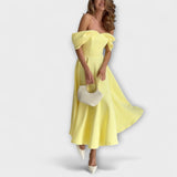 Romy - Elegantna maxi obleka z razkritimi rameni in drapiranjem