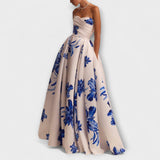 Rosalie - Elegantna cvetlična maxi obleka z off-shoulder dizajnom